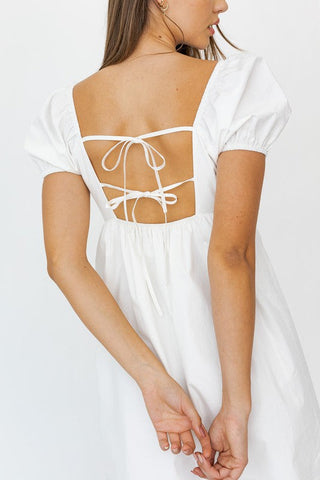 Short Sleeve Back Tie Detail Babydoll Dress - Premium  from LE LIS - Just $65! Shop now 