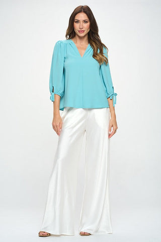 Solid V neck Top with Self Tie Sleeves - Premium  at Lonnys NY - Just $75! Shop Womens clothing now 